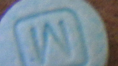 This undated photo provided by the Cuyahoga County Medical Examiners Office shows fentanyl pills. Authorities say they've arrested Ryan Gaston, a man in a Cleveland suburb after seizing more than 900 fentanyl pills marked liked tablets of the less-potent opiate oxycodone. The Cuyahoga County medical examiner said that lookalike pills were likely to blame for some of the county's 19 fentanyl-related overdose deaths in January 2016. (Cuyahoga County Medical Examiners Office via AP)