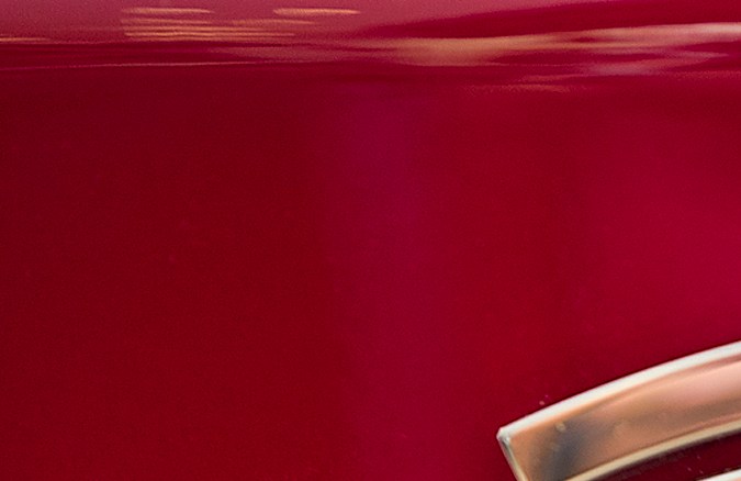 FILE - This Wednesday, Aug. 8, 2018, file photo shows the Tesla emblem on the back end of a Model S in the Tesla showroom in Santa Monica, Calif. The California Highway Patrol says it may have used the Autopilot system of a Tesla Model S to stop the car after its driver fell asleep early Friday, Nov. 30, 2018, in the San Francisco suburb of Redwood City. (AP Photo/Richard Vogel, File)