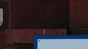 A man passes a California Department of Motor Vehicles office in the Arleta neighborhood of Los Angeles Tuesday, April 9, 2019. (AP Photo/Richard Vogel)