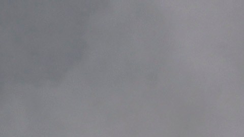 Grey clouds hang over the financial district of the City of London, Friday, Aug. 28, 2020. (AP Photo/Kirsty Wigglesworth)