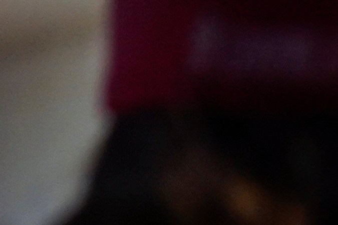 An employee of Angel Stadium serves a customer before a baseball game between the Boston Red Sox and the Los Angeles Angels Monday, July 5, 2021, in Anaheim, Calif. With baseball fans back in the stands and concessions being sold, ballpark employees have had a chance to return after the pandemic hit many of them hard. (AP Photo/Ashley Landis)