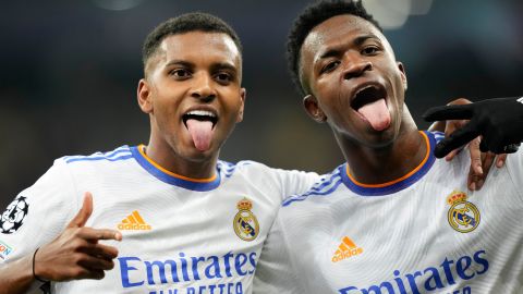 Real Madrid's Rodrygo, left, celebrates with Real Madrid's Vinicius Junior after scoring his side's fourth goal during the Champions League group D soccer match between Shakhtar Donetsk and Real Madrid at the Olympiyskiy stadium in Kyiv, Ukraine, Tuesday, Oct. 19, 2021. (AP Photo/Efrem Lukatsky)