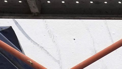 Artistas pintan un mural de Los Supercampeones.