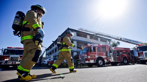 Firefighters respond to the Heritage Hotel after an explosion on Wednesday, Jan. 30, 2013, in San Diego. The cause of the explosion is under investigation. Three people were injured in the explosion at the hotel near SeaWorld San Diego and investigators were trying to determine whether there was a drug lab inside, authorities said. Three people were taken to a hospital to be treated for burns and one was in serious condition, said San Diego Fire-Rescue Department spokesman Maurice Luque. (AP Photo/Lenny Ignelzi)