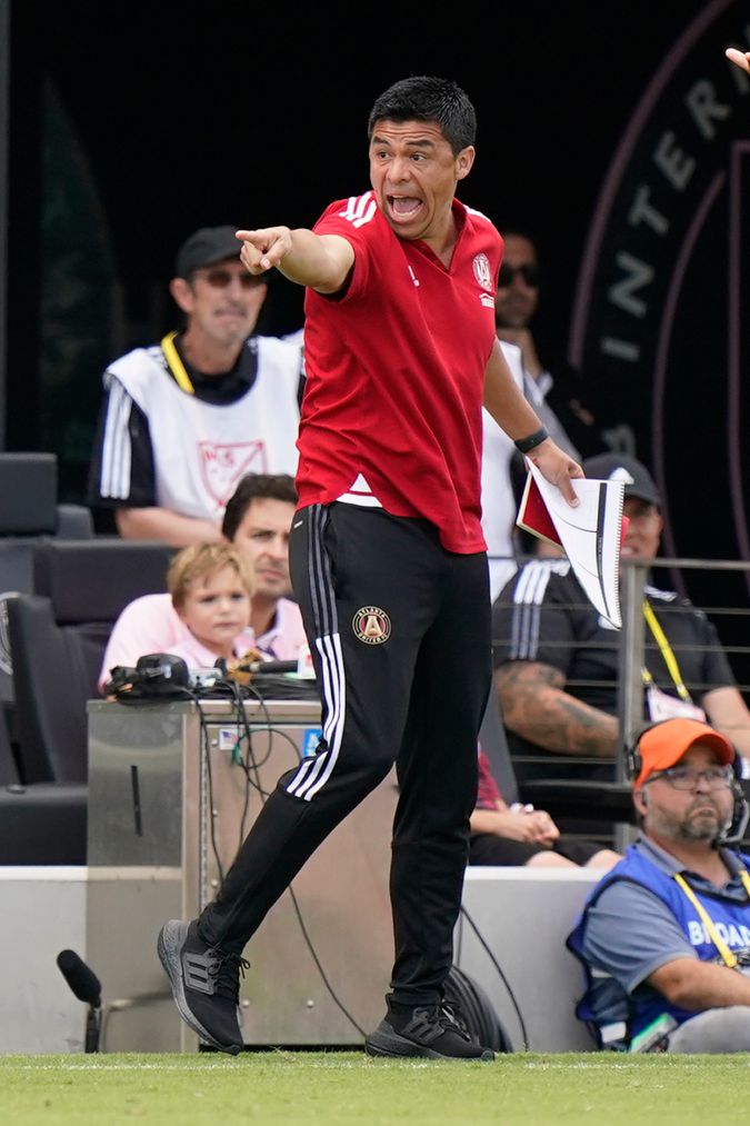 Atlanta United head coach Gonzalo Pineda calls out to players, Sunday, April 24, 2022, during the second half of an MLS soccer match against the Inter Miami in Fort Lauderdale, Fla. (AP Photo/Wilfredo Lee)