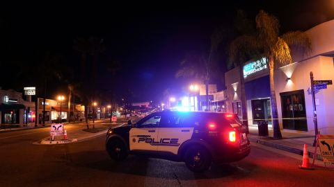 A police vehicle is seen near a scene where a shooting took place in Monterey Park, Calif., Sunday, Jan. 22, 2023. Dozens of police officers responded to reports of a shooting that occurred after a large Lunar New Year celebration had ended in a community east of Los Angeles late Saturday. (AP Photo/Jae C. Hong)