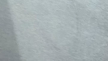 Emloyees of the Rostic's restaurant in Tverskaya street work at a kitchen during the opening ceremony in Moscow, Russia, Tuesday, April 25, 2023. Former KFC restaurants, which were rebranded after the U.S. chain left Russia, opened their doors as Rostic's in Moscow on Tuesday. (AP Photo/Alexander Zemlianichenko)