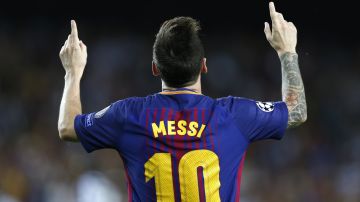 FILE - Barcelona's Lionel Messi celebrates after scoring his side's first goal during a Champions League group D soccer match between FC Barcelona and Juventus at the Camp Nou stadium in Barcelona, Spain, Tuesday, Sept. 12, 2017. Lionel Messi says he is coming to Inter Miami and joining Major League Soccer. After months of speculation, Messi announced his decision Wednesday, June 7, 2023,to join a Miami franchise that has been led by another global soccer icon in David Beckham since its inception but has yet to make any real splashes on the field. (AP Photo/Francisco Seco, File)