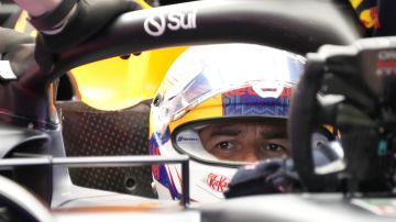 Red Bull driver Sergio Perez of Mexico prepares for the second free practice session at the Suzuka Circuit in Suzuka, central Japan, Friday, April 5, 2024, ahead of Sunday's Japanese Formula One Grand Prix. (AP Photo/Hiro Komae)