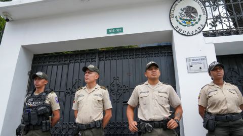 Police stand guard outside the the Mexican embassy, in Quito, Ecuador, Friday, April 5, 2024. Ecuador on Thursday declared Mexico's ambassador to Quito persona non grata due to recent statements made by Mexican President Andres Manuel Lopez Obrador regarding Ecuador's 2023 presidential elections. (AP Photo/Dolores Ochoa)