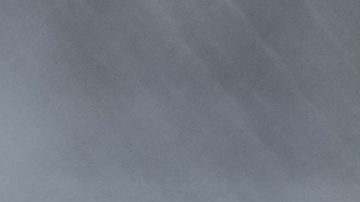 Pole position Red Bull driver Max Verstappen, left, of the Netherlands and teammate Sergio Perez of Mexico takes a break after the qualifying session at the Suzuka Circuit in Suzuka, central Japan, Saturday, April 6, 2024, ahead of Sunday's Japanese Formula One Grand Prix. (AP Photo/Hiro Komae)