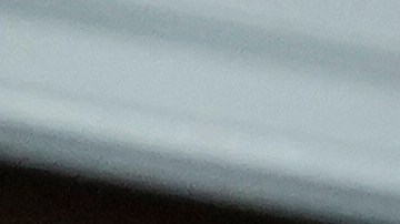 FILE - President Joe Biden speaks as Education Secretary Miguel Cardona listens at the White House, June 30, 2023, in Washington. Biden is traveling to Wisconsin Monday, April 8, 2024, to announce details of a new plan to help millions of people with their student loan debt. Last year, the U.S. Supreme Court foiled Biden's plan to provide hundreds of billions of dollars in student loan debt relief to millions. The visit comes a week after primary voting in the Midwest battleground state highlights weakness for him and Republican challenger Donald Trump. (AP Photo/Evan Vucci, File)