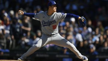 Los Angeles Dodgers starter Yoshinobu Yamamoto delivers a pitch during the first inning of an baseball game against the Chicago Cubs, Saturday, April 6, 2024, in Chicago. (AP Photo/Paul Beaty)