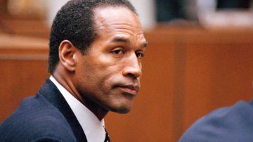 FILE - O.J. Simpson sits at his arraignment in Superior Court in Los Angeles on July 22, 1994, where he pleaded "absolutely, 100 percent not guilty" on murder charges. Simpson, the decorated football superstar and Hollywood actor who was acquitted of charges he killed his former wife and her friend but later found liable in a separate civil trial, died Wednesday, April 11, 2024, of prostate cancer. He was 76. (AP Photo/Pool/Lois Bernstein, Pool)