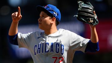 Chicago Cubs starting pitcher Javier Assad reacts after pitching against the Seattle Mariners during the first inning of a baseball game Sunday, April 14, 2024, in Seattle. (AP Photo/Lindsey Wasson)
