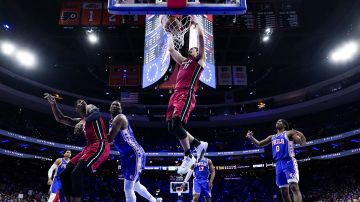 Miami Heat's Jaime Jaquez Jr., center, goes up for the dunk during the second half of an NBA basketball play-in tournament game against the Philadelphia 76ers, Wednesday, April 17, 2024, in Philadelphia. The 76ers won 105-104.(AP Photo/Chris Szagola)