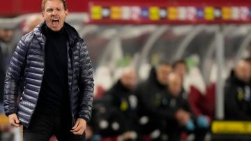 FILE - Germany coach Julian Nagelsmann during the international friendly soccer match between Austria and Germany at the Ernst Happel stadium in Vienna, Austria, Tuesday, Nov. 21, 2023. Germany coach Julian Nagelsmann has extended his contract beyond this summer’s European Championship by two years through the 2026 World Cup. (AP Photo/Matthias Schrader, File)