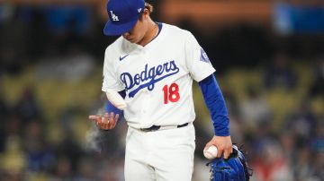 Los Angeles Dodgers starting pitcher Yoshinobu Yamamoto (18)of a baseball game in Los Angeles, Friday, April 19, 2024. (AP Photo/Ashley Landis)