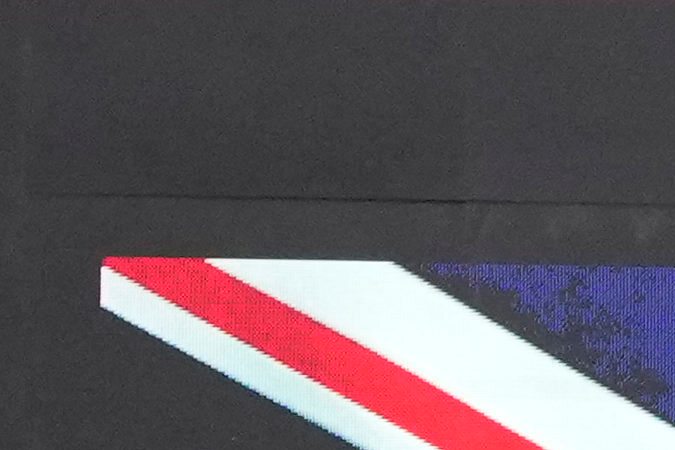 El neerlandés, Max Verstappen, campeón del Gran Premio de China acompañado de Lando Norris (McLaren), segundo y Sergio "Checo" Pérez, tercero.