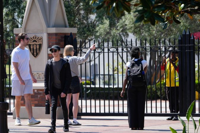 A fence closes access to the USC campu,s Monday, April 29, 2024, in Los Angeles. (AP Photo/Damian Dovarganes)