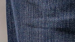 A groundstaff member works on the pitch ahead of the Six Nations rugby union international match between Scotland and England at Murrayfield, Edinburgh, Scotland, Saturday Feb. 8, 2014. (AP Photo/Scott Heppell)