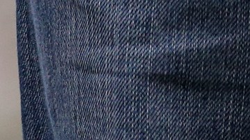 A groundstaff member works on the pitch ahead of the Six Nations rugby union international match between Scotland and England at Murrayfield, Edinburgh, Scotland, Saturday Feb. 8, 2014. (AP Photo/Scott Heppell)