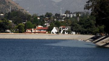 This April 9, 2010 photo shows the Department of Water's Silver Lake Reservoir in Los Angeles. The Department of Water and Power operates with a $5.7 billion budget and 8,600 employees. It runs 7,200 miles of pipeline that pump water into Los Angeles from rivers, as well as the Silver Lake Reservoir, around the region, and the electrical grid that powers the nation's second-largest city. (AP Photo/Damian Dovarganes)
