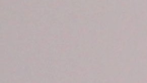 A Bahrain anti-government protester aims his slingshot toward riot police Friday, March 30, 2012, in Sitra, Bahrain, where widespread demonstrations remembering those who've died in the past year's unrest were broken up by police firing tear gas and clashes erupted. Amnesty International on Friday urged Bahrain to free a leading human rights activist who is on a hunger strike and reminded the Gulf kingdom's rulers to fulfill promises to release all those jailed for speaking out during the country's uprising. (AP Photo/Hasan Jamali)