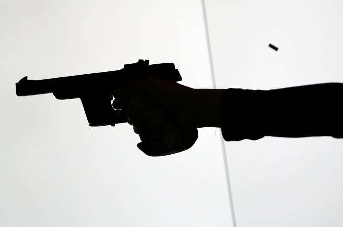 An athlete competes during the women's 25 meter pistol qualification precision competition at Olympic Shooting Center at the 2016 Summer Olympics in Rio de Janeiro, Brazil, Tuesday, Aug. 9, 2016. (AP Photo/Eugene Hoshiko)