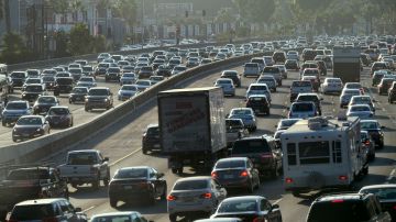 FILE - This Sept. 9, 2016 file photo shows rush hour traffic moving along the Hollywood Freeway in Los Angeles. The city long known for its sprawl and glacial traffic is fighting over what it should become in the future. An election Tuesday, March 7, 2017, features a proposal intended to restrict taller, denser development in the city of nearly 4 million, a chapter in a long-running battle over density and what the city should look like in the years to come. (AP Photo/Richard Vogel, File)
