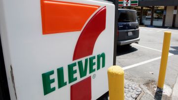 FILE - In this July 1, 2008, file photo, a 7-Eleven is shown in Palo Alto, Calif. The convenience store continued its tradition of offering free Slurpees on July 11 on July 11, 2017. (AP Photo/Paul Sakuma, File)