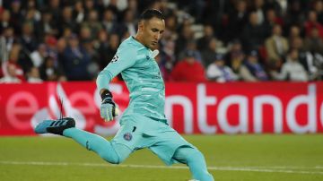 PSG's goalkeeper Keylor Navas clears the ball during the Champions League group A soccer match between PSG and Real Madrid at the Parc des Princes stadium in Paris, Wednesday, Sept. 18, 2019. (AP Photo/Francois Mori)