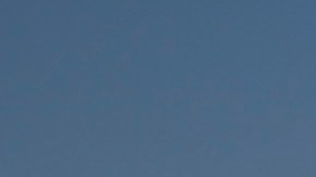 California Highway Patrol officer Matthew Musselmann uses a lidar gun for speed detection along Interstate 5 freeway, Thursday, April 23, 2020, in Anaheim, Calif. The CHP is issuing a lot more tickets to motorists where lanes are wide open during the coronavirus pandemic. From March 19, when the stay-at-home order began, through April 19, officers issued 87% more citations to drivers suspected of speeding in excess of 100 mph. That's compared to the same period last year. The jump in speeding tickets coincides with a 35% decline in traffic volume. (AP Photo/Chris Carlson)