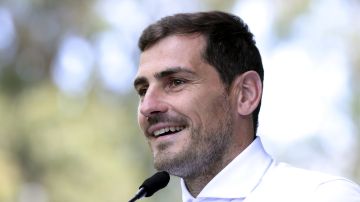 FILE - In this Monday, May 6, 2019 file photo, Spanish goalkeeper Iker Casillas talks to journalists outside a hospital in Porto, Portugal. Former Spain and Real Madrid goalkeeper Iker Casillas said Monday June 15, 2020, he will not run for president of the Spanish soccer federation. Casillas said the main reason that led him to change his mind was “the exceptional social, economic and health situation that our country is suffering.” (AP Photo/Luis Vieira, File)