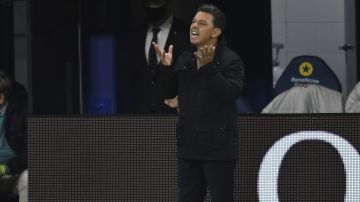 Marcelo Gallardo, coach of River Plate, gestures during a local league soccer match against Boca Juniors at the Bombonera stadium in Buenos Aires, Argentina, Sunday, May 16, 2021. (Marcelo Endelli/Pool via AP)