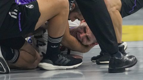 Real Madrid's Gabriel Deck reacts after sustaining an injury during the Euroleague basketball match between Partizan and Real Madrid, in Belgrade, Serbia, Thursday, May 4, 2023. (AP Photo/Darko Vojinovic)