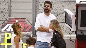 Former Barcelona football star Gerard Pique and his girlfriend Clara Chia Marti stand at pit prior to the start of the MotoGP race of the Catalunya Motorcycle Grand Prix at the Catalunya racetrack in Montmelo, just outside of Barcelona, Spain, Sunday, Sept. 3, 2023. (AP Photo/Joan Monfort)