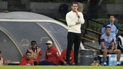 Guadalajara's coach Fernando Gago stands at the sideline during a CONCACAF Champions Cup, round of sixteen, second leg soccer match against America at Azteca stadium in Mexico City, Wednesday, March 13, 2024. (AP Photo/Eduardo Verdugo)