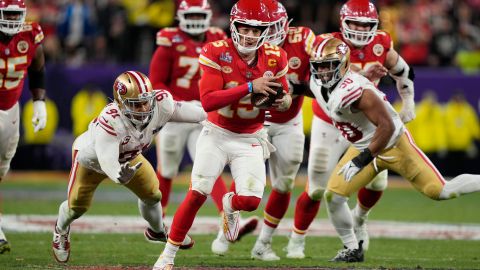 Kansas City Chiefs quarterback Patrick Mahomes (15) scrambles against the San Francisco 49ers in the NFL Super Bowl 58 football game Sunday, Feb. 11, 2024, in Las Vegas. The Chiefs defeated the 49ers 25-22 in overtime.(AP Photo/Doug Benc)