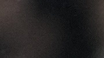 West Ham's Edson Alvarez, left, is challenged by Leverkusen's Florian Wirtz during the Europa League quarterfinal second leg soccer match between West Ham and Bayer 04 Leverkusen in London, Thursday, April 18, 2024.(AP Photo/Kin Cheung)