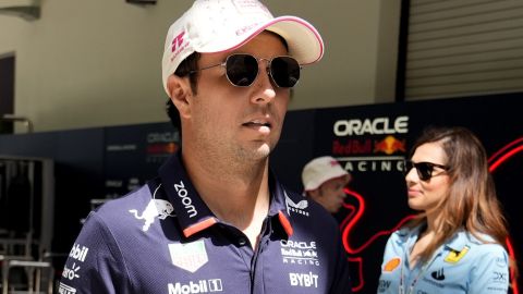 Red Bull driver Sergio Perez, left, of Mexico, arrives at the Miami Formula One Grand Prix auto race Sunday, May 5, 2024, in Miami Gardens, Fla. (AP Photo/Lynne Sladky)