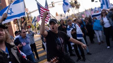 Pro-Israel supporters chant their slogan as they march outside the University of Southern California campus in Los Angeles, Wednesday, May 8, 2024. (AP Photo/Jae C. Hong)
