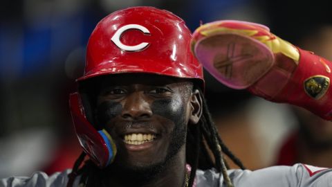 Cincinnati Reds' Elly De La Cruz reacts after scoring off of a wild pitch by Los Angeles Dodgers starting pitcher Tyler Glasnow during the fifth inning of a baseball game in Los Angeles, Thursday, May 16, 2024. (AP Photo/Ashley Landis)