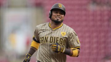 San Diego Padres' Luis Arraez runs the bases after hitting a home run against the Cincinnati Reds during the first inning of a baseball game Wednesday, May 22, 2024, in Cincinnati. (AP Photo/Carolyn Kaster)