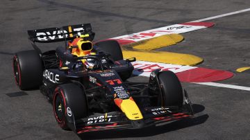 Red Bull driver Sergio Perez of Mexico steers his car during the qualifying session ahead of the Formula One Monaco Grand Prix at the Monaco racetrack, in Monaco, Saturday, May 25, 2024. (Claudia Greco/Pool Photo via AP)