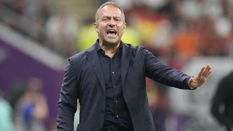 FILE - Then Germany's head coach Hansi Flick calls out to his players during the World Cup group E soccer match between Spain and Germany, at the Al Bayt Stadium in Al Khor , Qatar, Sunday, Nov. 27, 2022. Barcelona has hired former Germany and Bayern Munich coach Hansi Flick as the replacement for Xavi Hernandez. It’s the 59-year-old Flick’s first coaching job since being fired by Germany in September last year. (AP Photo/Luca Bruno, File)