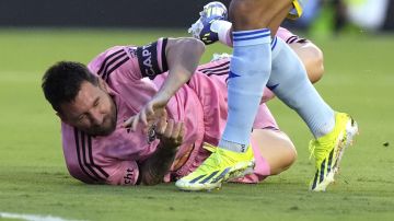 Inter Miami forward Lionel Messi falls to the pitch during the first half of the team's MLS soccer match Wednesday against Atlanta United, May 29, 2024, in Fort Lauderdale, Fla. (AP Photo/Lynne Sladky)