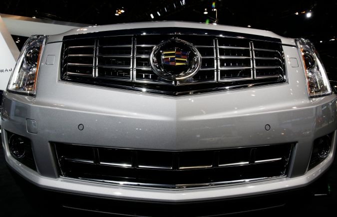 2014 Cadillac SRX is displayed during the media preview of the Chicago Auto Show at McCormick Place in Chicago on Thursday, Feb. 6, 2014. Chicago Auto Show will be open to the public February 8 through February 17. (AP photo/Nam Y. Huh)