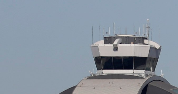 Airplanes sit on the tarmac at Los Angeles International Airport Friday, Nov. 1, 2013. Thousands of fliers were delayed Friday after a shooting in Terminal 3 closed parts of the airport for hours, prompting authorities to evacuate a terminal and stop flights headed for the city from taking off from other airports. Los Angeles police said a suspected gunman has been taken into custody. (AP Photo/Gregory Bull)