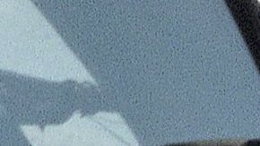 California Highway Patrol officer Rob Lund gives Virginia Luk of Temple City, Calif., a warning for exceeding the speed limit on Interstate 210 in Altadena, California on Sunday, Dec. 17, 1995. Lund says that the CHP will be strictly enforcing the new speed limits. (AP Photo/Mark J. Terrill)